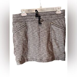 Athleta Sport Skort stripe zip pocket